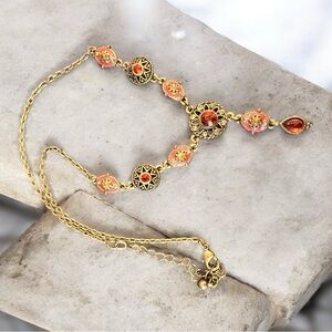 Vintage Nina Ricci Necklace For Avon
Brass Tone Y Drop.